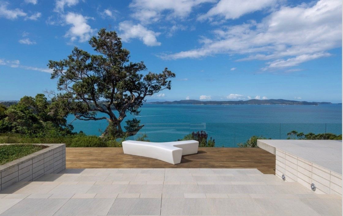 Seating area overlooking the sea at the Mahurangi Peninsula home