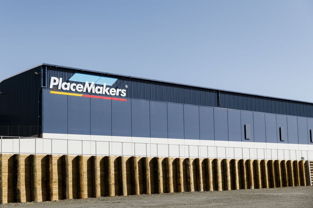Blue PlaceMakers building and retaining wall