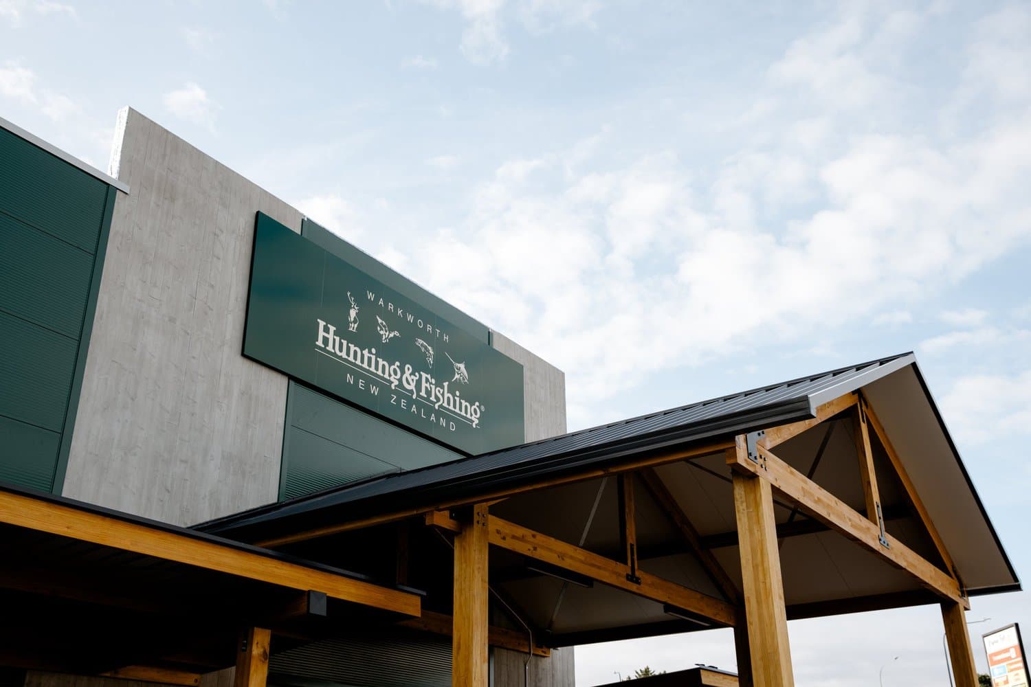 Hunting and Fishing retail frontage with timber entrance canopy